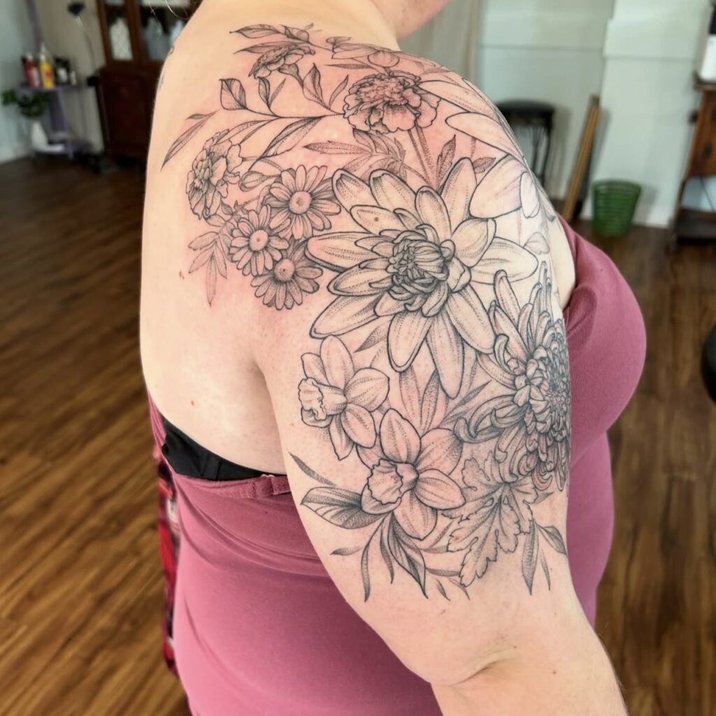 black and grey floral shoulder cap and upper arm piece